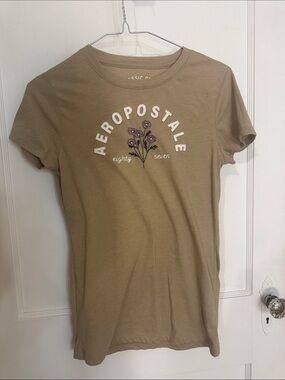 Aeropostale Tan Graphic Short Sleeve Tee with Purple Floral Accent